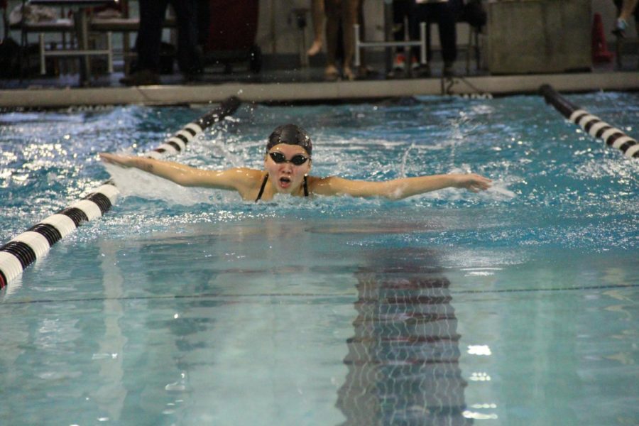 Coppell High School sophomore Megan Li swims at the intrasquad “Vaquero Battle” meet in November. The meet on May 2-4 will consist of scrimmages between CHS swimmers and culminate in a competition with J.J. Pearce High School. 
