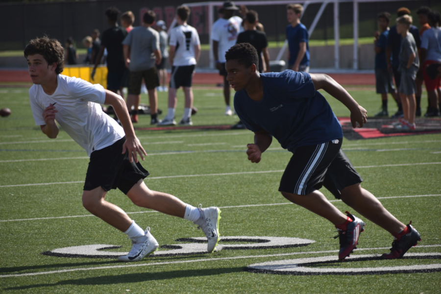 CHS9 freshmen Spencer Kutchins and Isaiah Francis run drills at the Solomon Thomas Youth Football Camp, which took place at Buddy Echols Field on Saturday morning. The three-hour camp consisted of rotating stations for kids ages 8-16. 
