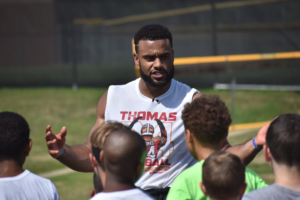 San Francisco 49ers defensive end and Coppell High School 2014 graduate Solomon Thomas gives instructions for a group of campers attending the Solomon Thomas Youth Football Camp. The three-hour camp consisted of rotating stations for kids ages 8-16 and took place at Buddy Echols Field on Saturday morning. 