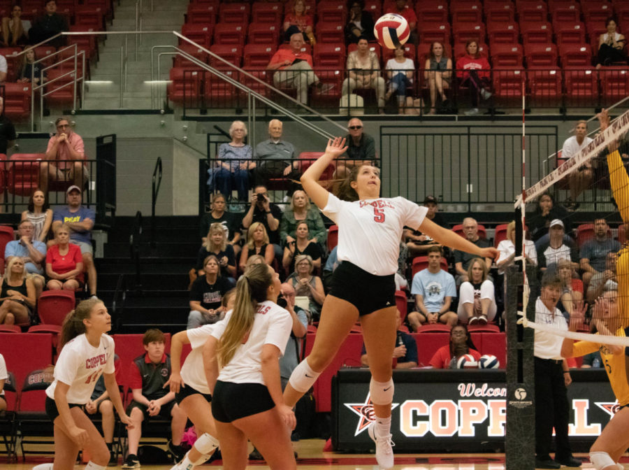 Coppell+junior+middle+blocker+Madison+Gilliland+goes+for+a+spike+during+Tuesday%E2%80%99s+volleyball+match+against+McKinney+at+the+CHS+Arena.+After+three+close+sets%2C+the+Cowgirls+defeated+the+Lionettes%2C+3-0.