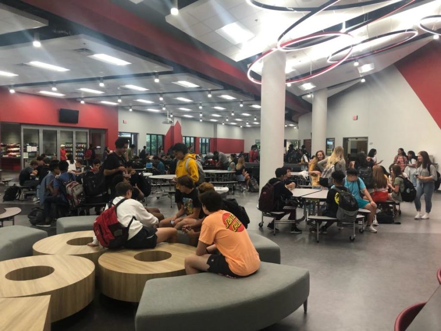 Freshmen interact with each other in the CHS9 cafeteria on Wednesday morning. CHS9 is beginning its second year in operation for the 2019-20 school year. 