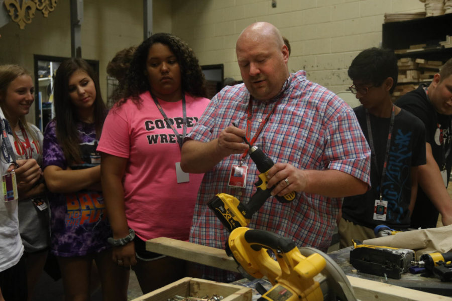 Coppell High School technical theater director Dominic Klovensky teaches his students the basics of woodwork during his sixth period technical theater class. Students in Klovensky’s class have recently been learning woodwork terminology.