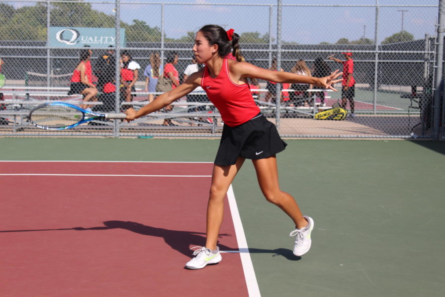 Coppell’s Sofia Sanchez, a New Tech High @ Coppell senior, defends her side of the court as her opponent makes a move on Tuesday at the CHS Tennis Center. Coppell tennis defeated Lewisville, 18-1.