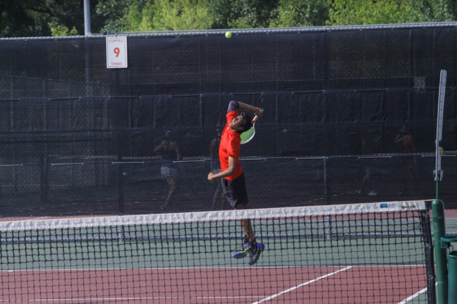 Coppell tennis sophomore Vinay Patel plays a doubles match with senior Clark Parlier against Highland Park on Friday at the CHS Tennis Center. Coppell lost, 11-4, and Highland Park remains undefeated.