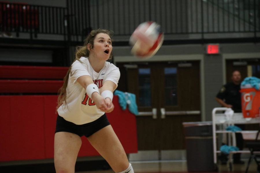 Coppell senior defensive specialist Isabelle Bowles digs during the District 6-6A match against Marcus on Tuesday at CHS Arena. The Cowgirls lost to the Marcus in three sets, 25-21, 25-19 and 25-23.