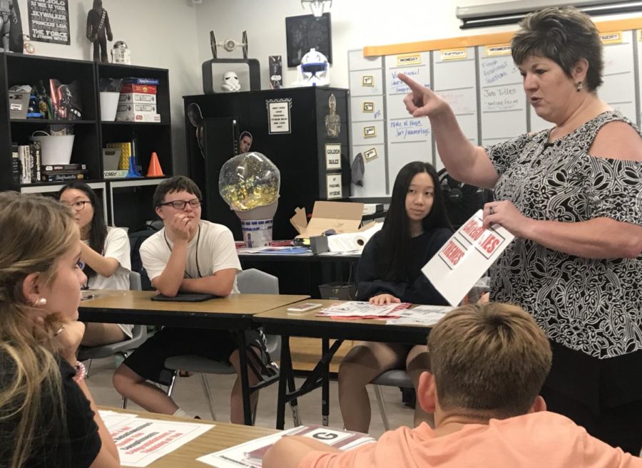 Coppell High School special education teacher Melissa Murray gives directions to her seventh period Applied Vocational Experience class about the next preparation phase of their business and year-long class project called A Note of Hope. This business provides a service where CISD students can send anyone kind, uniquely designed notes for free.
