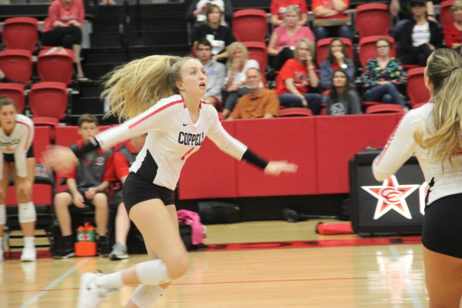 Coppell senior Peyton Minyard prepares to spike during the match against Arlington Martin on Aug. 27 in the CHS Arena. Minyard committed to Boston College and will receive a volleyball scholarship. 
