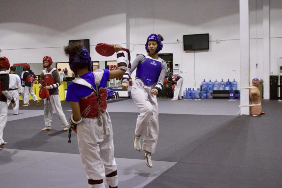 New Tech High @ Coppell sophomore Arwyn Sullivan practices taekwondo at Grapevine Mills NTA Center on Sept. 19 from 5-8 p.m. Sullivan is now part of the Amateur Athletic Union (AAU) National Team and will be competing in their tournaments.