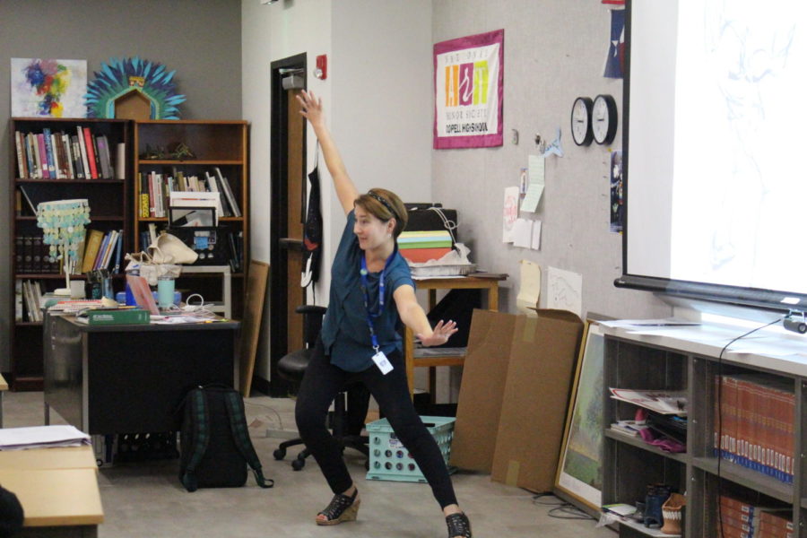 Coppell High School art teacher Michelle Hauske demonstrates motion to her fifth period Art II Drawing class. Hauske is The Sidekicks first teacher of the issue.