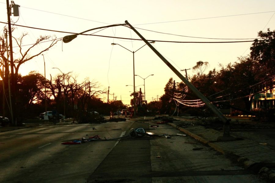 Scattered+debris+from+street+lights+and+trees+lie+on+Royal+Lane+in+Dallas+on+Monday.+Nine+tornadoes+hit+North+Dallas+Sunday+night+and+devastated+many+businesses%2C+residential+areas+and+schools.
