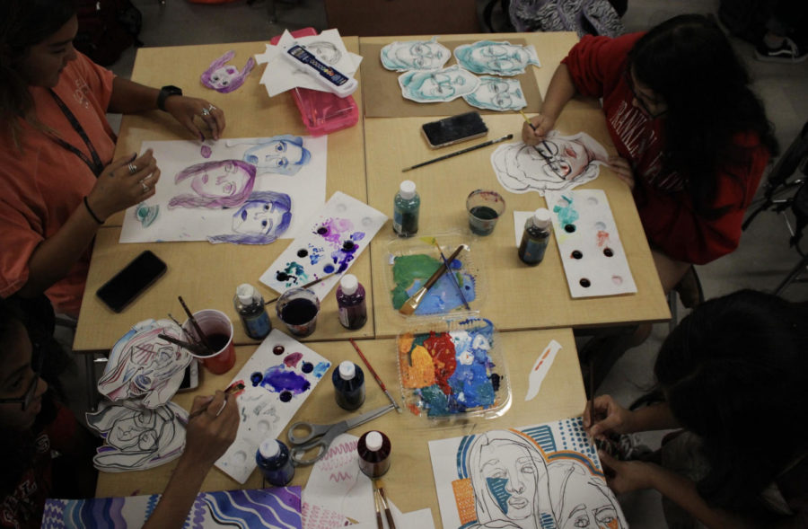 Coppell sophomores Vedanti Nantod, Hanna Lozano, Jaseran Chowdhury and Tulsi Patel finish their contour drawing projects during Michelle Hauske’s art II drawing class on Oct. 10. The class is currently learning about the art of contour drawing, which is the outline of the subject that is being drawn.
