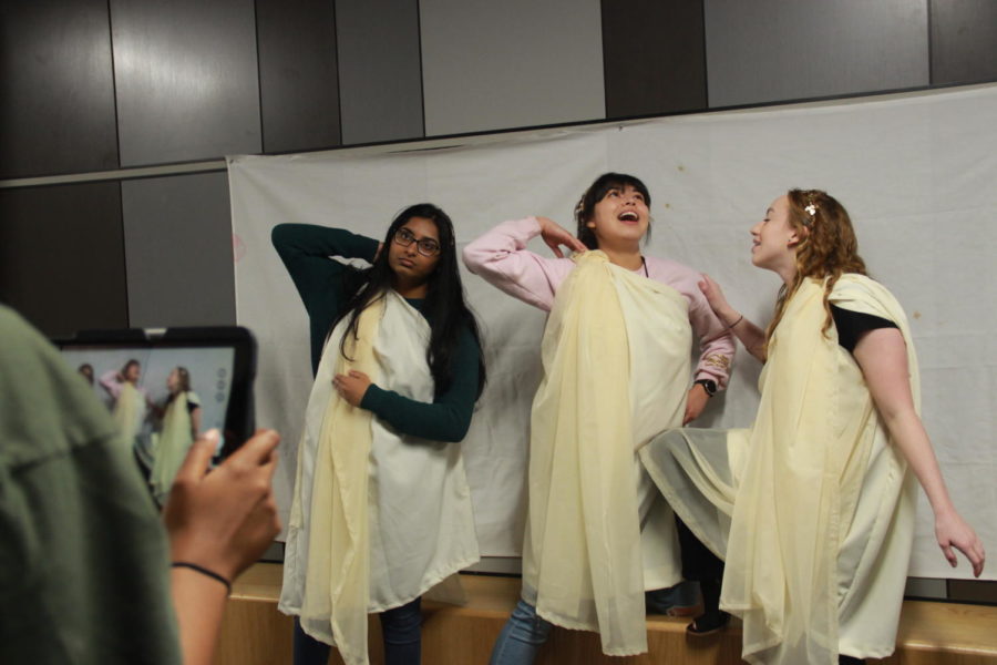 Coppell High School seniors Keerthi Durairaj, Penelope Gummelt and Katherine Hollen recreate the ancient sculpture, Laocoon and His Sons, in Michelle Hauskes second period art history class. Students are recreating the ancient Olympic Games through AP Art History Olympics.