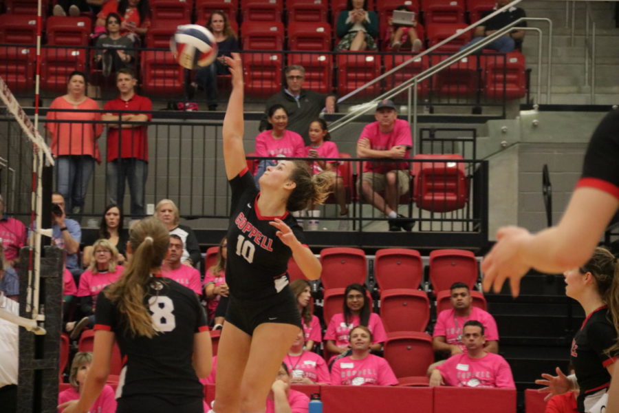 Coppell senior setter Kinsey Bailey leaps for the ball at the volleyball match against Flower Mound last night in the CHS Arena. The Jaguars swept the Cowgirls in three sets, 25-20, 25-22, 25-10. 