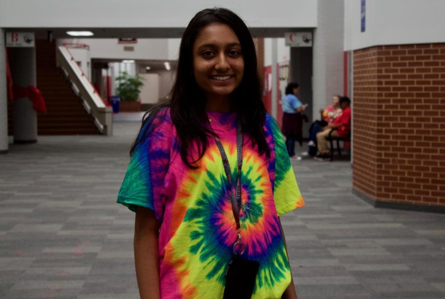 Coppell+High+School+sophomore+Chinmayi+Mohite+wears+her+tie+dye+shirt+on+Tuesday+during+eighth+period+to+dress+up+for+homecoming+week.+The+dress+up+schedule+for+this+week+is+Merica+Monday%2C+Tie+Dye+Tuesday%2C+Way+Back+Wednesday%2C+Jersey+Thursday+and+Spirit+Friday.