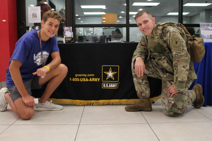 Coppell senior Johan Pretorius, pictured next to staff sergeant Michael Bell in the CHS Commons during a U.S. Army visit, verbally committed to West Point after an offer to join the Army’s swim team. Pretorius has dedicated his time to swimming and has been previously featured in The Sidekick for his accomplishments in swimming.