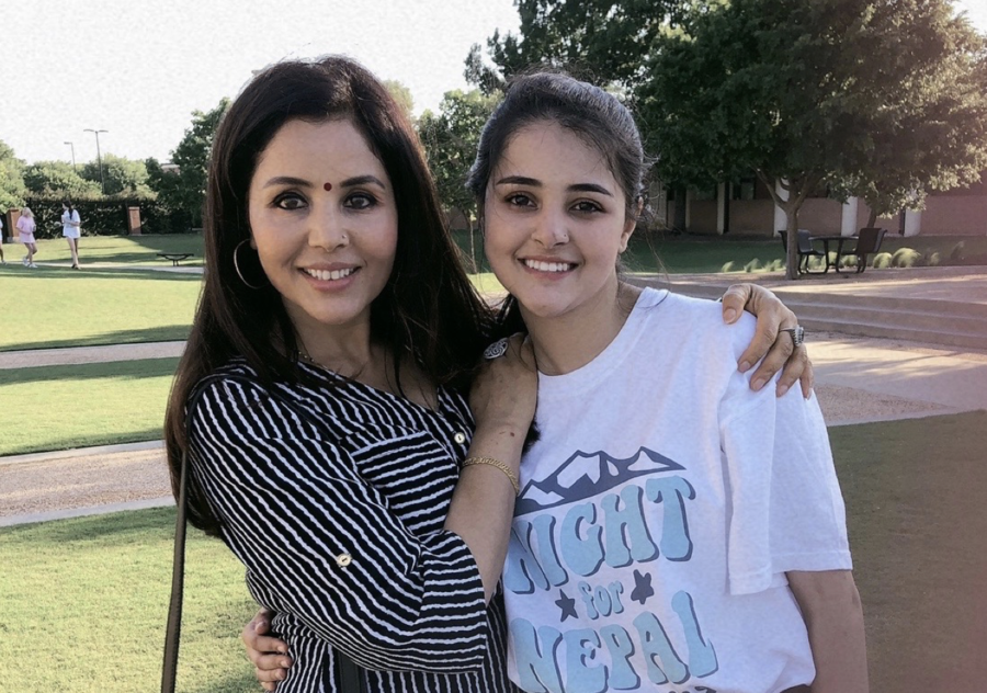 Valley Ranch resident Mala Lamichhane poses with her daughter, Coppell High School senior and Night for Nepal president Ichha Lamichhane during the Night for Nepal Movie Night at the Coppell City Hall on April 27. The club is planning to hold the event again in April at an undecided new location.