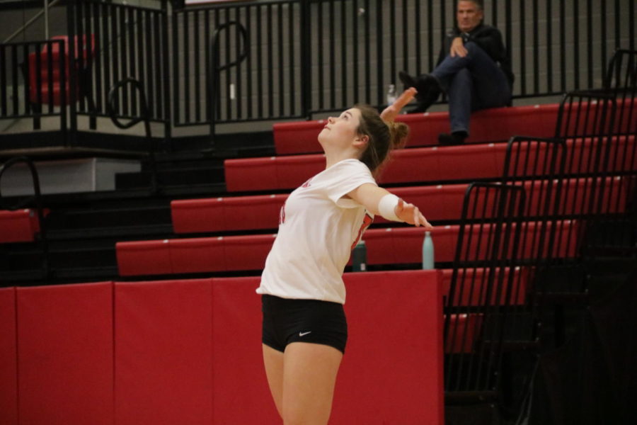 Coppell senior defensive specialist Isabelle Bowles serves during the District 6-6A match against Irving on Friday in the CHS Arena. The Cowgirls defeated the Tigers in three sets, 25-6, 25-3, 25-9.