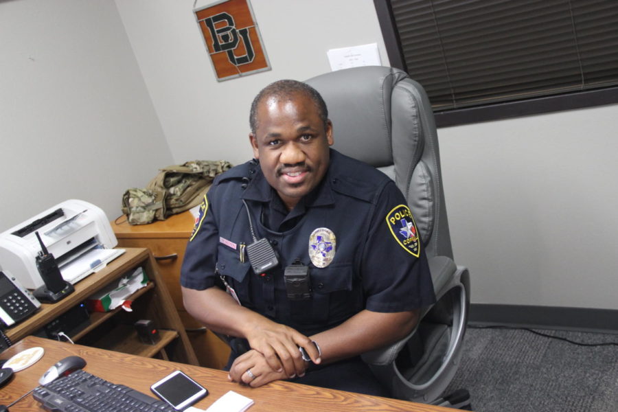 Coppell High School Student Resource Officer Reggie Walker works at his office during third period on September 5th. Walker transitioned from accountant to police officer to help make an impact on students. 