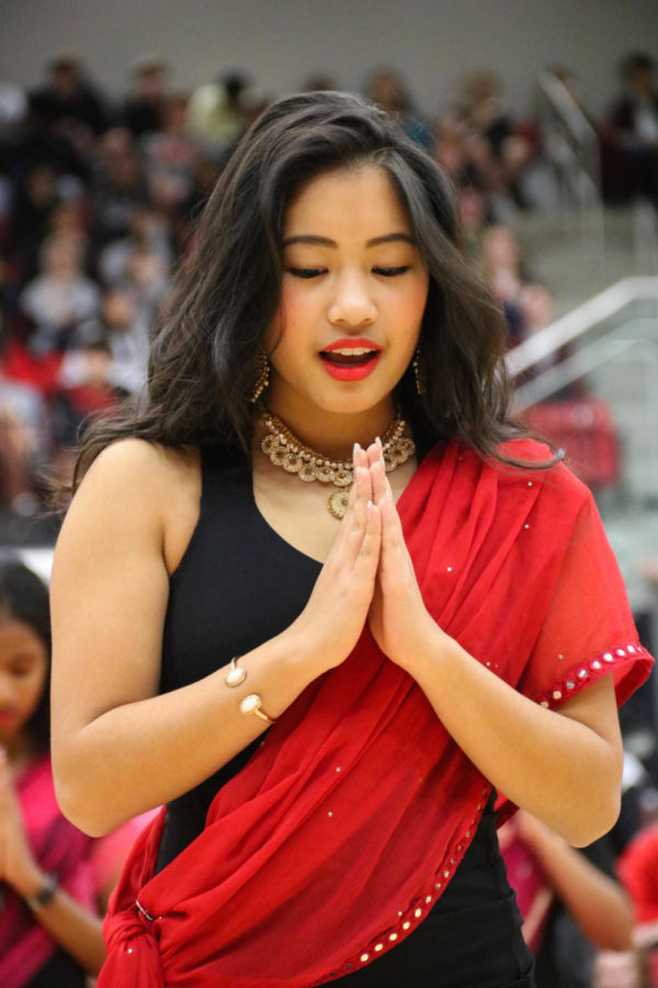 Coppell High School senior Samantha Bui performs with Respira during the pep rally on Friday held in the CHS Arena. The pep rally was held in order to celebrate the upcoming football game.
