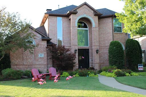 The Coppell swim team flocked a Coppell resident’s house on Oct. 22. The swim team places flamingoes outside the homes of Coppell residents as a fundraising effort. 