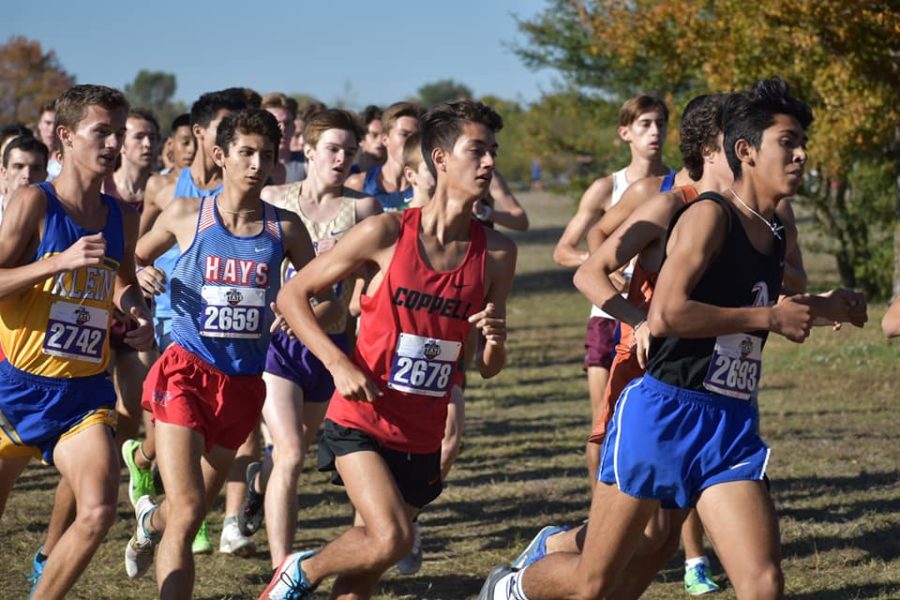 Coppell junior Evan Caswell stays at the front of the pack at the Class 6A State Meet at Old Settlers Park in Round Rock on Saturday. Caswell placed fourth overall with a time of 14:48.34 and the Coppell boys took seventh place, with the Cowgirls finishing fourth in the state. Photo courtesy Colin Proctor.