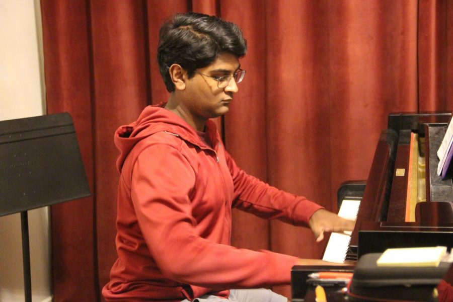 Coppell+High+School+sophomore+Joseph+Mathew+practices+Chopin%E2%80%99s+Fantaisie+Impromptu+Op.+66+at+the+home+of+his+piano+teacher%2C+Hwa+Lee%2C+on+Nov.+8.+Mathew+performed+this+piece+at+Carnegie+Hall+in+New+York+City+on+Dec.+14.+