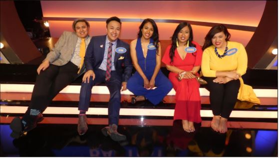 (Left to right) Family members: Trey Bautista, Ryne Bautista, Leana Funa, Cottonwood Creek Elementary fourth grade teacher Krixia Funa and Mintee Bautista sit together on the set of Family Feud in Los Angeles. Krixia Funa and her family appeared on the famous game show and won a $42,000 cash prize and Jeep.