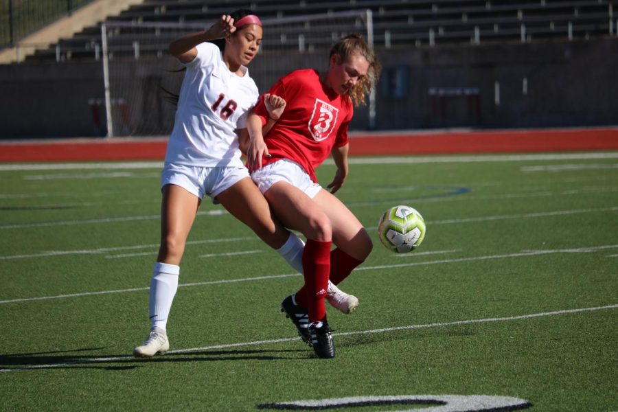 Coppell junior defender Chloe Phan attempts to steal during the scrimmage against Belton on Saturday at Buddy Echols Field. The Cowgirls defeated the Tigers, 2-0. 