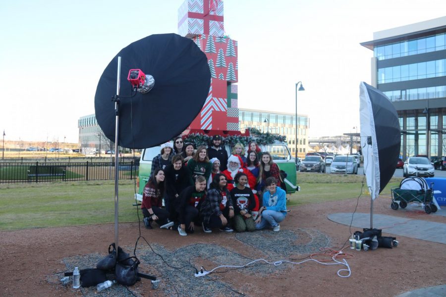 Dallas School of Rock students pose with Santa and Mrs. Claus during a free photo opportunity at The Sound at Cypress Waters. Santa was at The Sound at Cypress Waters on Saturday and attendees had the opportunity to take photos with him and shop at the pop-up market.