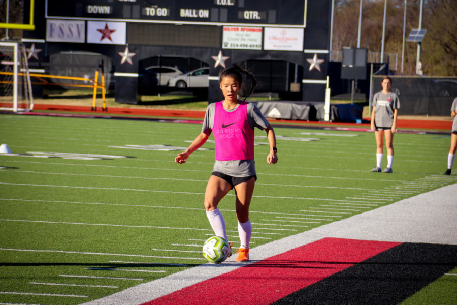 Coppell sophomore forward Michelle Pak executes a ball roll during a drill in fourth period soccer practice on Dec. 2 at Buddy Echols Field. As a freshman, Pak was on the JV soccer team before moving up to varsity early on in the 2019-20 season. 