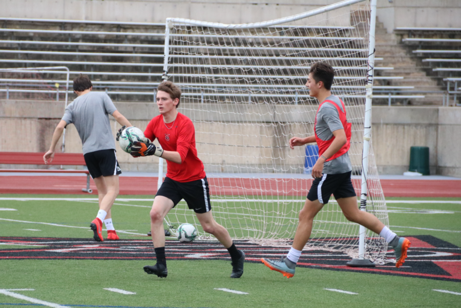 Coppell senior goalkeeper Kyler Henderson throws during practice on Nov. 21 on Buddy Echols Field. The Coppell soccer team faces Frisco Wakeland in its first scrimmage of the season on Thursday at Buddy Echols Field at 7:30 p.m.