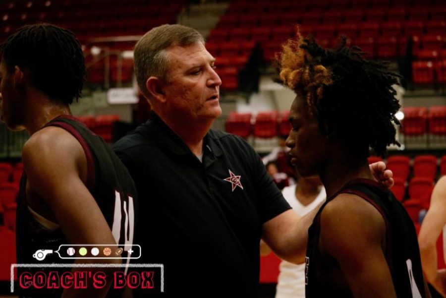 Coppell+basketball+coach+Clint+Schnell+talks+to+Mesquite+players+on+Dec.+10+in+the+CHS+Arena+following+the+nondistrict+game.+Schnell+has+been+the+head+Coppell+boys+basketball+coach+for+two+years.