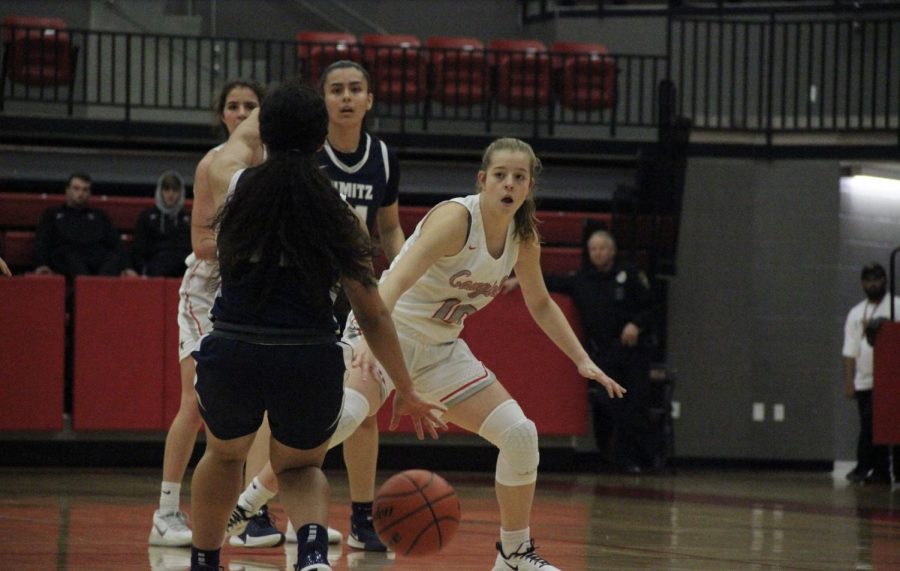 Coppell+junior+guard+Emma+Sherrer+defends+against+Irving+Nimitz+on+Friday+at+the+CHS+Arena.+The+Cowgirls+face+Irving+MacArthur+tonight+at+8+p.m.