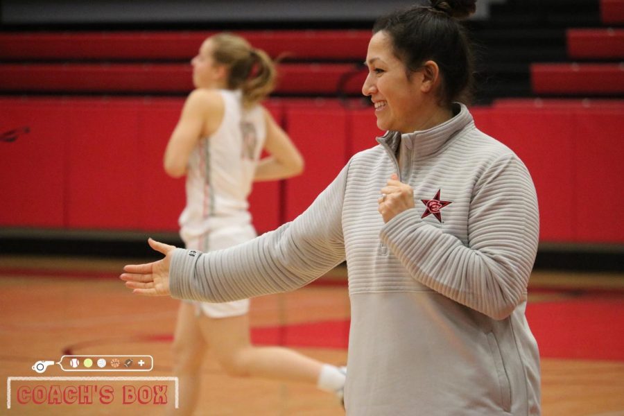 Coppell+assistant+girls+basketball+coach+Julieann+Hartsburg+high+fives+players+during+the+pregame+introduction+during+their+District+6-6A+game+against+Irving.+Hartsburg+previously+worked+as+the+street+team+coordinator+for+the+Dallas+Mavericks.%0A