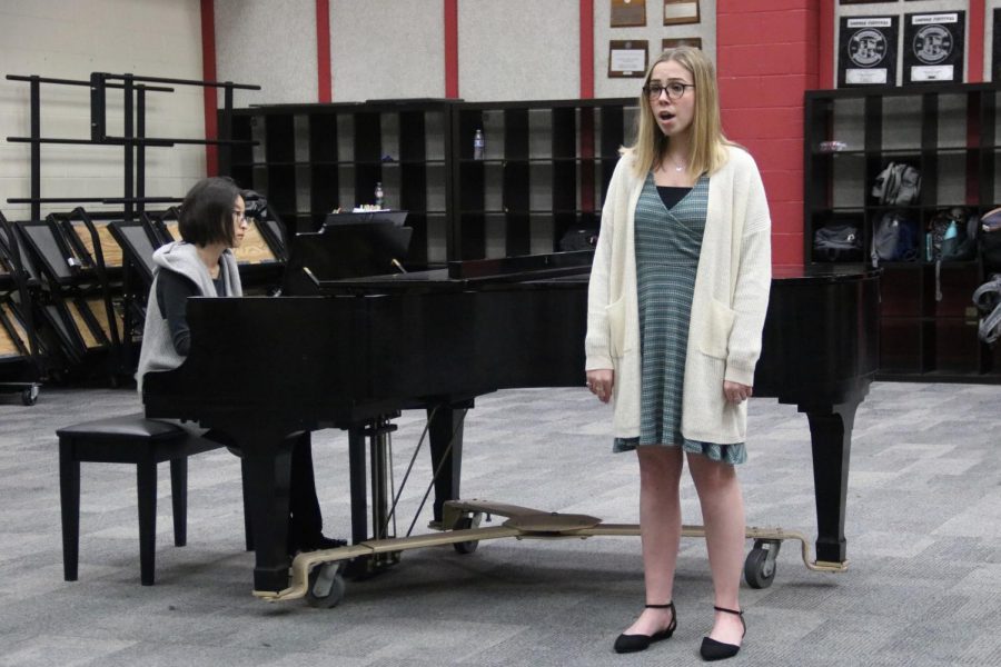 Coppell High School sophomore Caitlynn Hargrove performs “Sebben Crudele” by Antonio Caldara in Bona Coogle’s sixth period choir class on Thursday. Choir is having recitals for practice to prepare them for competitions. 