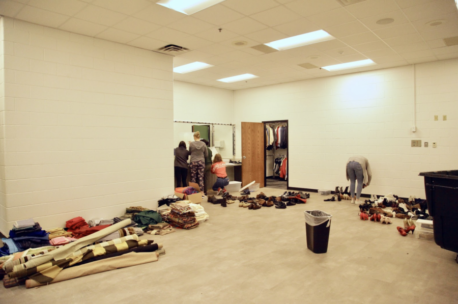 Students organize the Coppell High School green room during Karen Ruth’s second period Studio Premier theater class on Thursday. The green room recently finished undergoing renovations. 