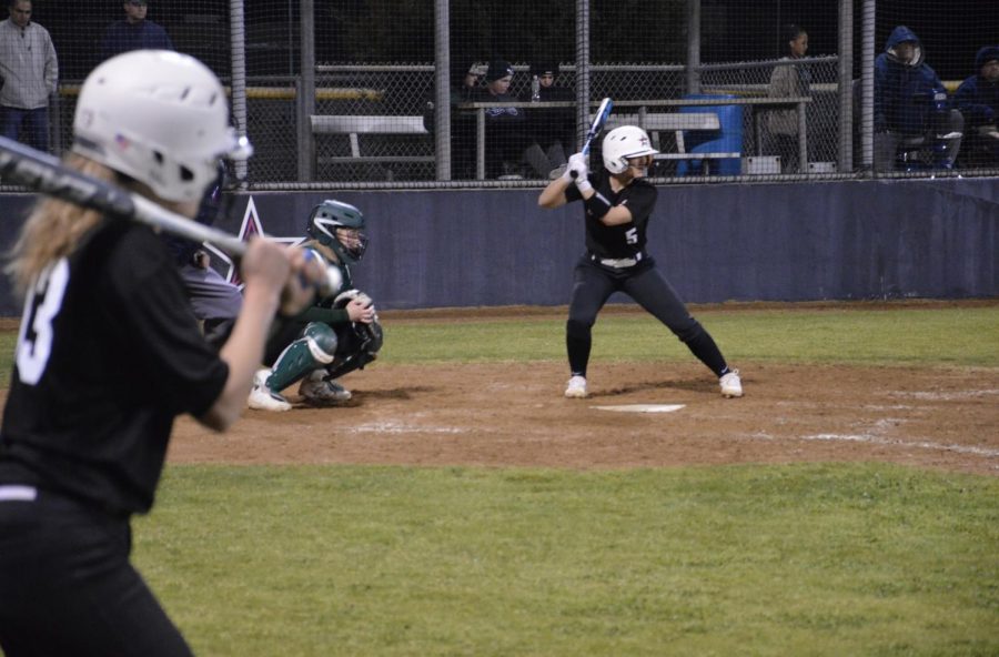 Coppell junior catcher Dafne Mercado bats in the fifth inning during Friday night’s scrimmage at the Coppell ISD Softball Complex. The Cowgirls play Frisco Lebanon Trail tonight at the CISD Softball Complex at 7 p.m.
