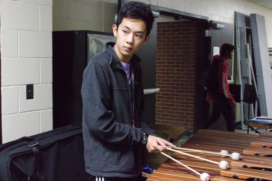Coppell+High+School+senior+Andrew+Tao+practices+the+marimba+during+a+private+lesson+in+the+fine+arts+hallway+on+Jan.+23.+Tao+is+a+percussionist+with+the+CHS+band+who+has+qualified+to+All-State+for+all+four+years+of+high+school.+