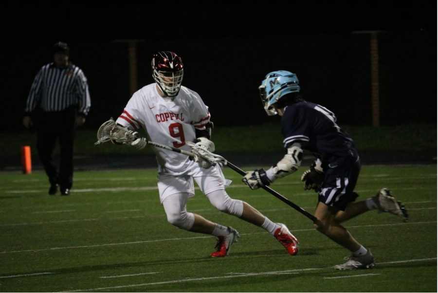 Coppell senior midfielder Max LaMendola guards Jimmy Kehoe’s running path on Wednesday at Coppell Middle School North. The Cowboys won their second game of the season against McKinney, 14-5.