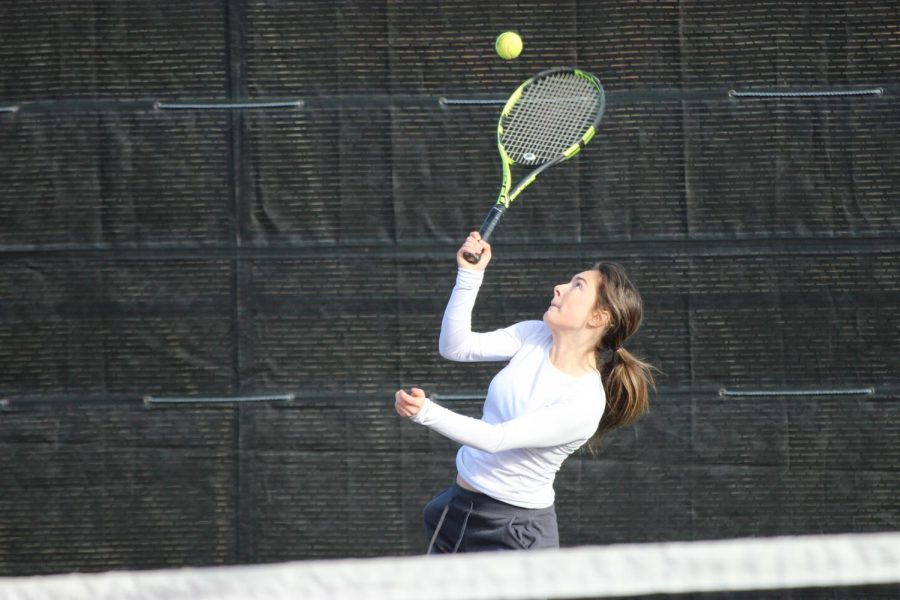 Coppell senior Reagan Stone returns a shot during her doubles match at the CHS Tennis Center on Friday. The Coppell Super Bowl spanned Friday through Saturday and saw 16 teams compete, some traveling from as far as Houston.