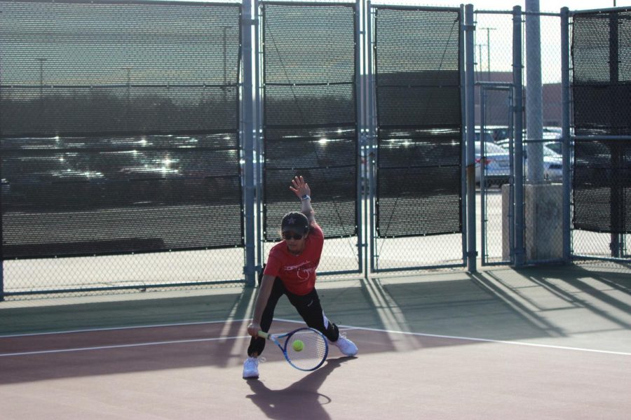 Coppell junior Rishita Uppuluri carries out a half volley during her doubles match at the CHS Tennis Center on Friday. The Coppell Super Bowl was held on Friday and Saturday and saw 16 teams compete, some traveling from as far as Houston.