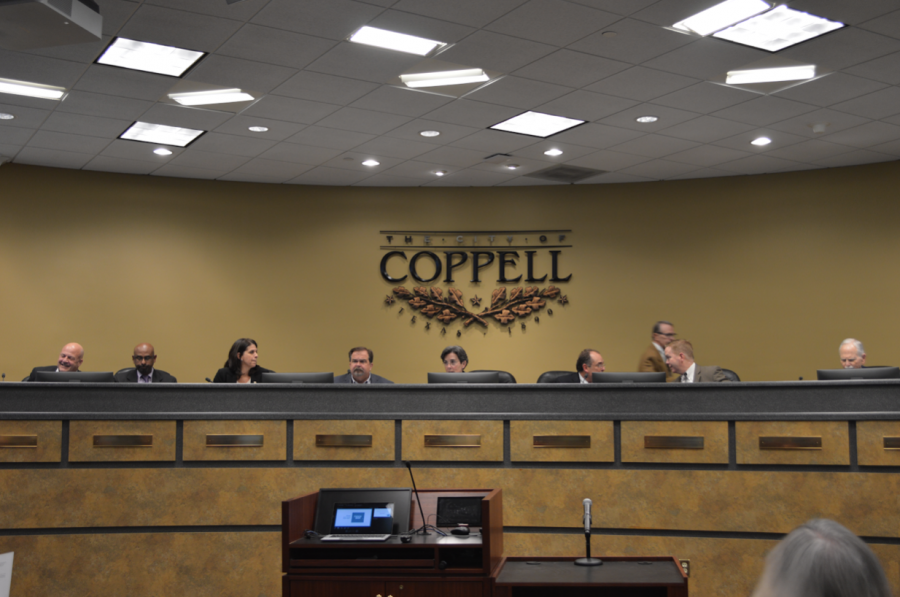 Coppell City Council members discuss potential decrease in annual revenue for Coppell at the meeting at Town Center yesterday. Issues such as a possible 16% decrease in revenue and the process of answering census questions were discussed.