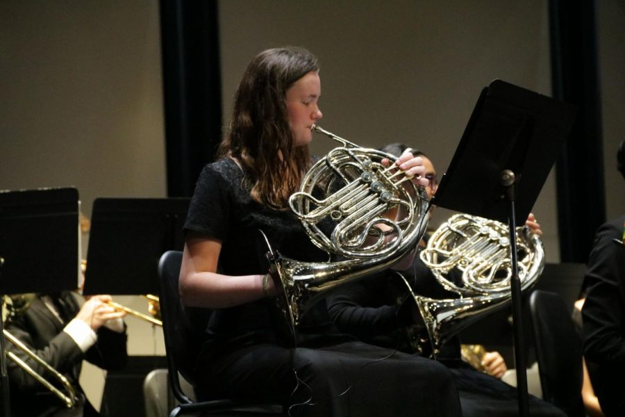 Coppell High School senior Sydney Watson plays her horn at the Mid-Winter band concert on Tuesday in the CHS Auditorium. The annual concert showcases every band at CHS and CHS9.
