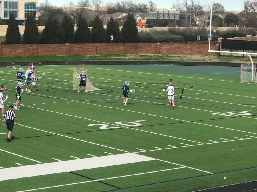 Coppell junior midfielder Tyler Wendel passes from his dodging spot on Saturday at Coppell Middle School North. The Cowboys take on McKinney at 7:30 p.m. tonight at Coppell Middle School North.