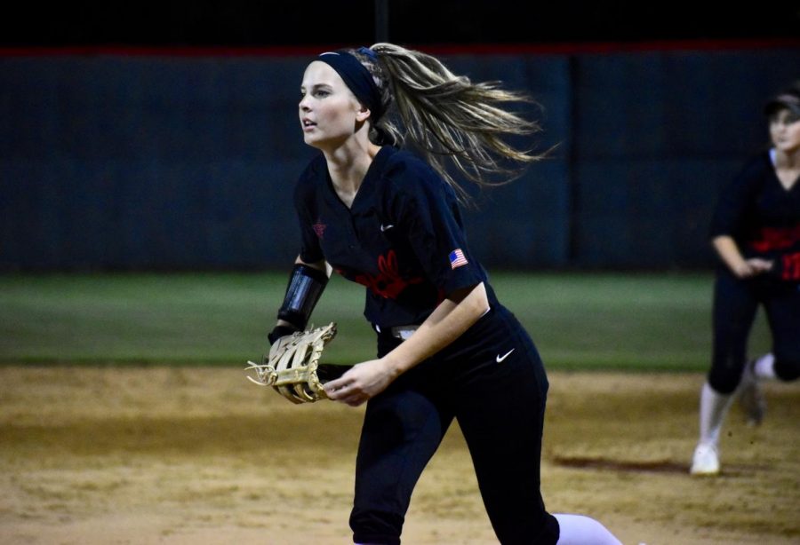 Coppell senior first baseman Olivia Reed runs to catch during the game against Keller at Colleyville Heritage High School last season. The Cowgirls play their first home game tomorrow at 7 p.m. at the Coppell ISD Softball Complex against Mansfield. 