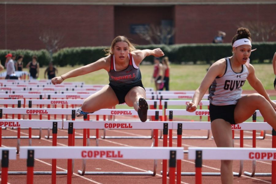 Coppell+junior+runner+Issabela+Hinojos+places+first+in+the+girls+JV+100-meter+hurdles+on+Saturday+at+Buddy+Echols+Field.+Overall%2C+the+girls+placed+second+and+boys+placed+third+in+the+Coppell+Relays.