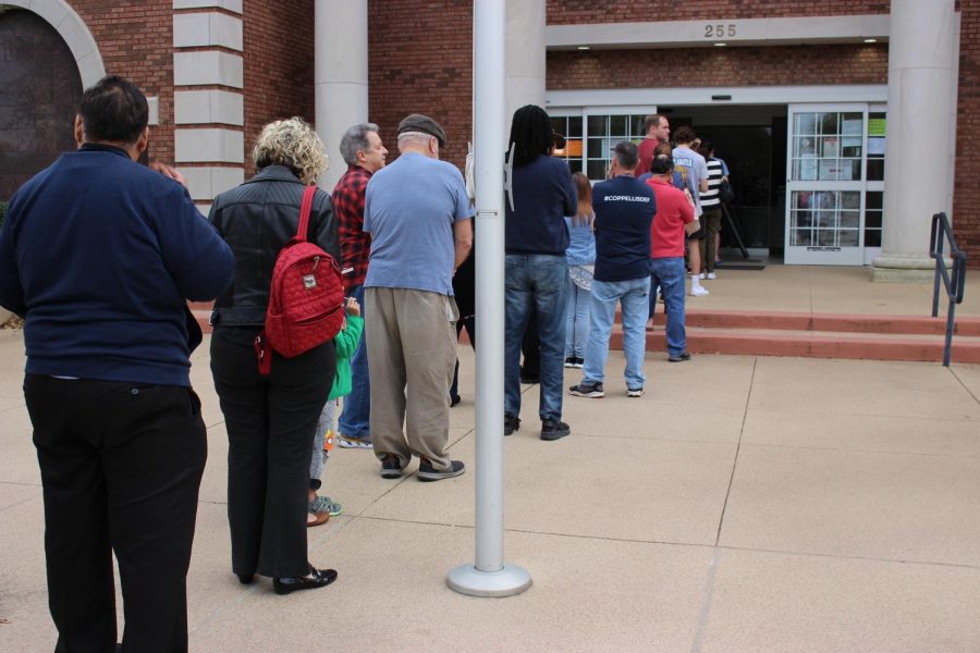 Voters stand in line at the Coppell City Hall to vote on Super Tuesday. Democratic Presidential Candidate Joe Biden won the Democratic Primary in Texas while President Donald Trump won the Republican Primary in Texas.