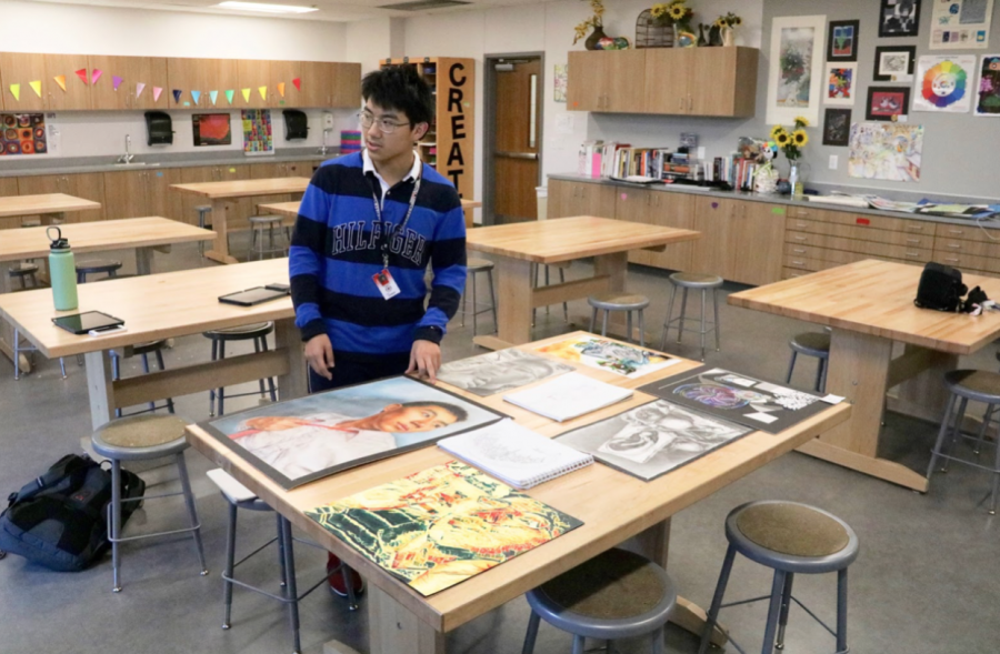 CHS9 student Jeffrey Wang displays his art in CHS9 art instructor Elsa Reynolds’s class on Feb. 24. Wang qualified for the Visual Arts Scholastic Event (VASE) competition and volunteers to paint sunflowers at The Gatehouse. Photo by Anthony Onalaja