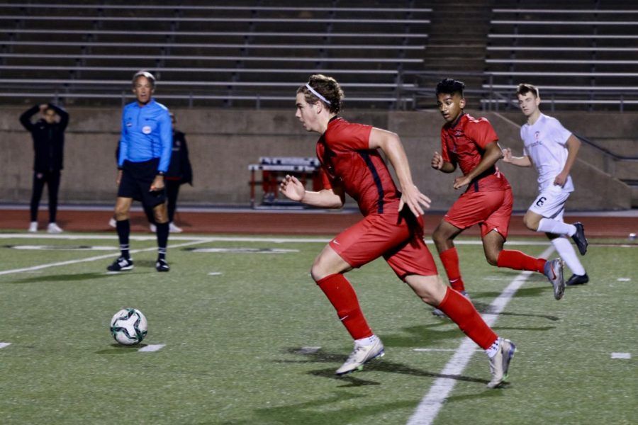 Coppell senior midfielder Sebastian Blaas dribbles against Marcus on Tuesday at Buddy Echols Field. The Cowboys upset the state’s No. 1 ranked team, 2-1, on a goal by senior striker Tom Vazhekatt with 10 minutes to play in the match.
