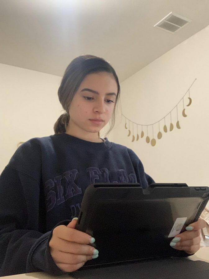 High School junior Paola Hernandez, does her IB English class work on her school issued iPad. Coppell ISD campuses are closed through at least May 4 due to COVID-19. Courtesy photo Paola Hernandez.